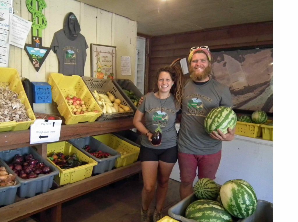 Tessa & Jesse working the farm stand